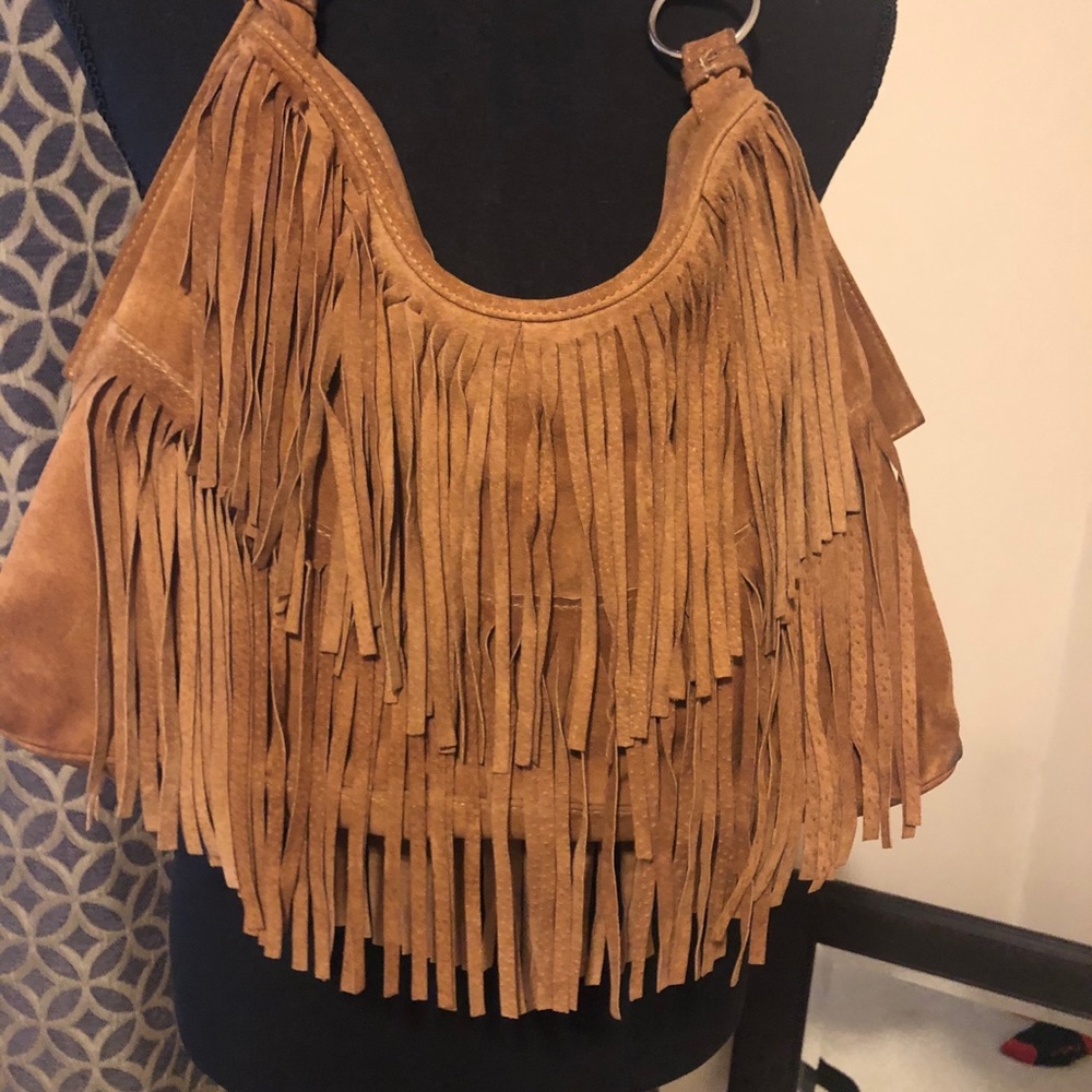 Suede WL bag with fringes.
